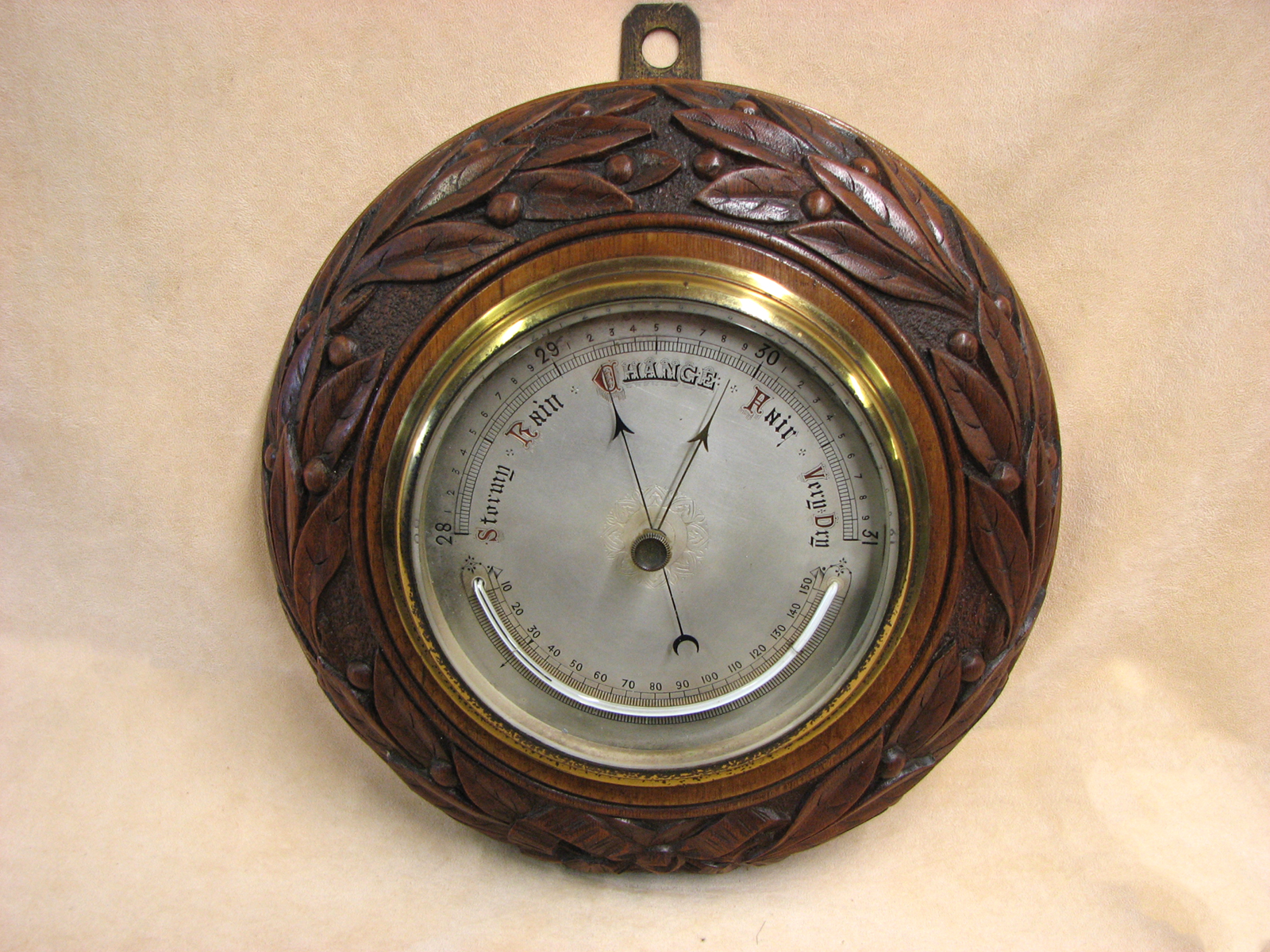 Edwardian Art Nouveau style wall barometer with thermometer in oak surround